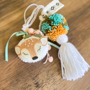 White Reindeer & Coordinating Pom Tassel Stocking Hanger Set