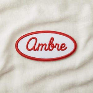 Gepersonaliseerde ovale geborduurde patch - Opstrijkbare geborduurde naampatch voor kinderdagverblijf, school of kledingtassen - geborduurde naam voor personalisatie