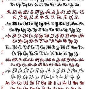 May include: A display of nine cursive font examples, showcasing the alphabet in both upper and lower case. The text "Exemple d'&eacute;criture" is at the top. The fonts vary in style, with some including decorative elements.