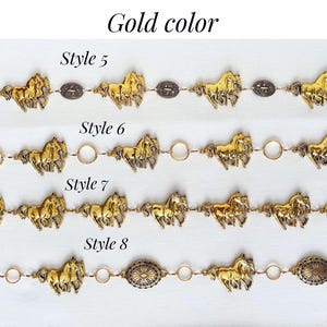 May include: Gold-colored belts with horse designs. The belts are displayed in rows, showcasing different styles. The text "Gold color" and style numbers 5, 6, 7, and 8 are visible. The belts feature horse-shaped ornaments and decorative elements.