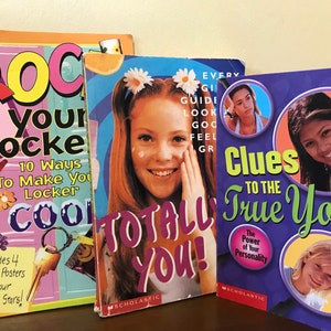 May include: Three paperback books with colourful covers and titles related to self-improvement and teenage life. The titles are "Rock Your Locke", "Totally You!" and "Clues to the True You".