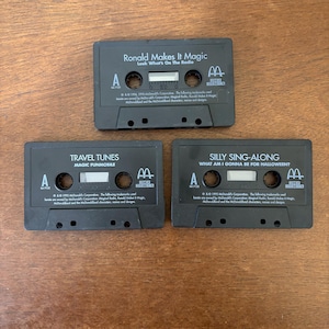 1995 McDonalds Promo Cassettes Kid Rhino - Lot de 3 Ronald Makes It Magic, Silly Sing Along, Travel Tunes