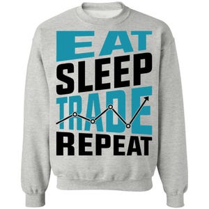 May include: A light gray crewneck sweatshirt featuring the text EAT SLEEP TRADE REPEAT in a combination of black and teal lettering. The word TRADE is overlaid with a black line graph showing upward and downward trends with circular points.
