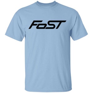 May include: A light blue t-shirt with the word "FAST" printed in black on the front.