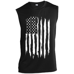 May include: Black sleeveless shirt with a white distressed American flag design.
