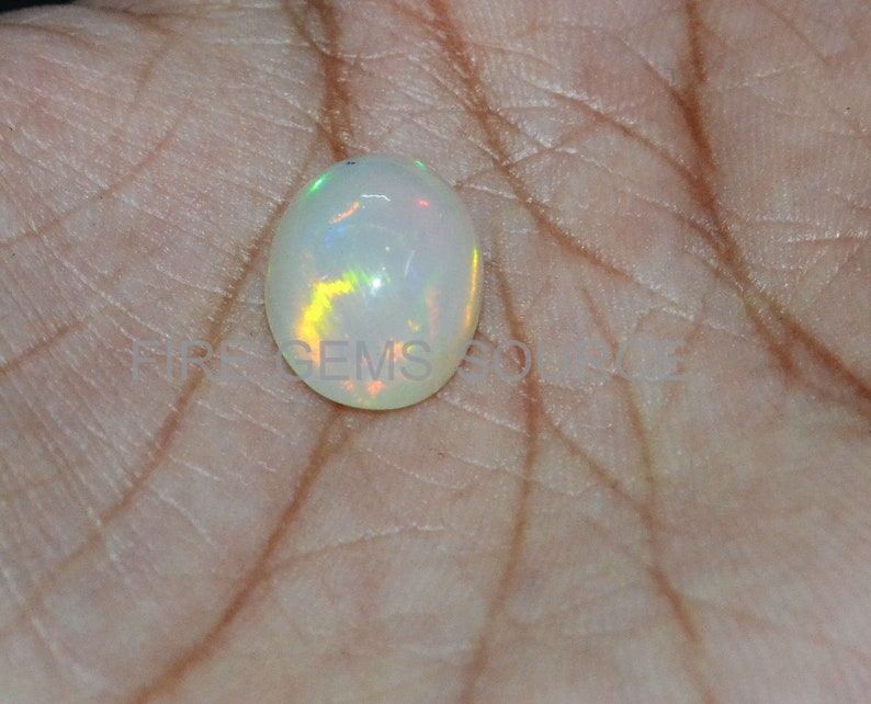 AAA Quality Natural Ethiopian Opal Cabochons Flash Ethiopian Opal Cabochons EO-4FGS79 10x13x7 mm