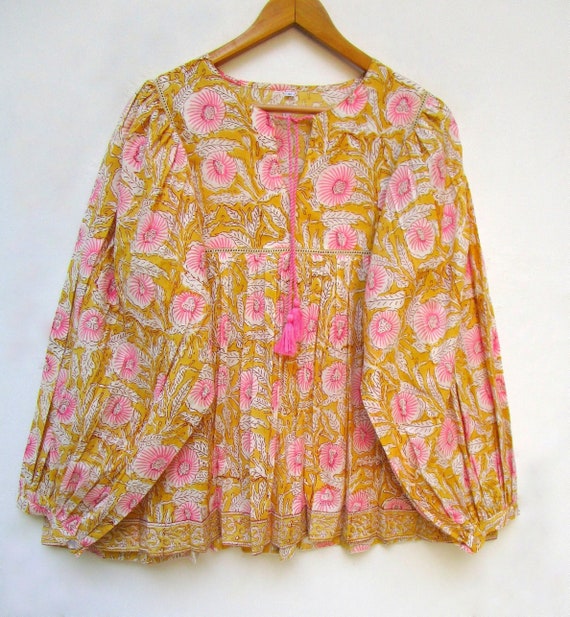 Blusas amarillas estampadas hotsell
