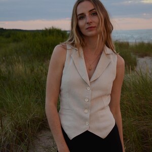 White Sleeveless Button Down Vest Top