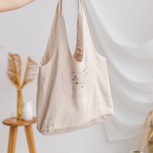 Nachhaltige Schultertasche aus Stoff mit Handstickerei, Einkaufstasche aus Leinen mit Tasche, wiederverwendbarer natürlicher Canvas Sack mit langen Henkeln