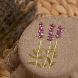 Linen jar cover with embroidered lavender