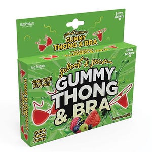 May include: A green box of "Sweet & Sour Gummy Thong & Bra" candy. The box features the text "Gummy Thong & Bra" in large white letters, with a strawberry, raspberry, blueberry, and other fruit. The box also has red bra and thong illustrations.