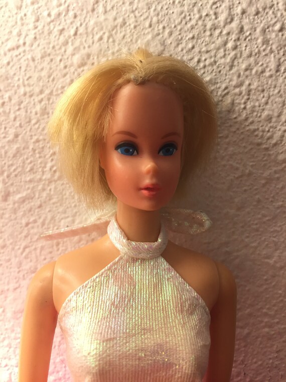 barbie with hair cut off