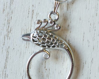 Collana in argento con uccello del paradiso