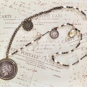 Long coin necklace, brass, pearls, sterling silver