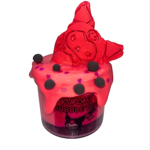 May include: A cup of pink slime with a red Kuromi figure on top. The slime has black and purple accents, and the cup has the words "Kuromi Bubble Tea" printed on it. The slime is a vibrant, eye-catching product.