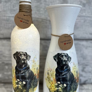 May include: Two white painted vases with a black Labrador Retriever design. The vases are decorated with twine and a brown tag that says "Handmade with Love".