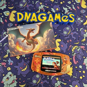 May include: A red and orange Game Boy Advance SP console with a fiery design. The console is displaying the Pokemon FireRed Version game. The console is sitting on a blue background with a pattern of purple and yellow characters.