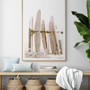 This is a sepia vertical photograph wall art print of surf boards at the iconic Hotel Del Coronado in San Diego, California. The sepia gives it a nostalgic feel.