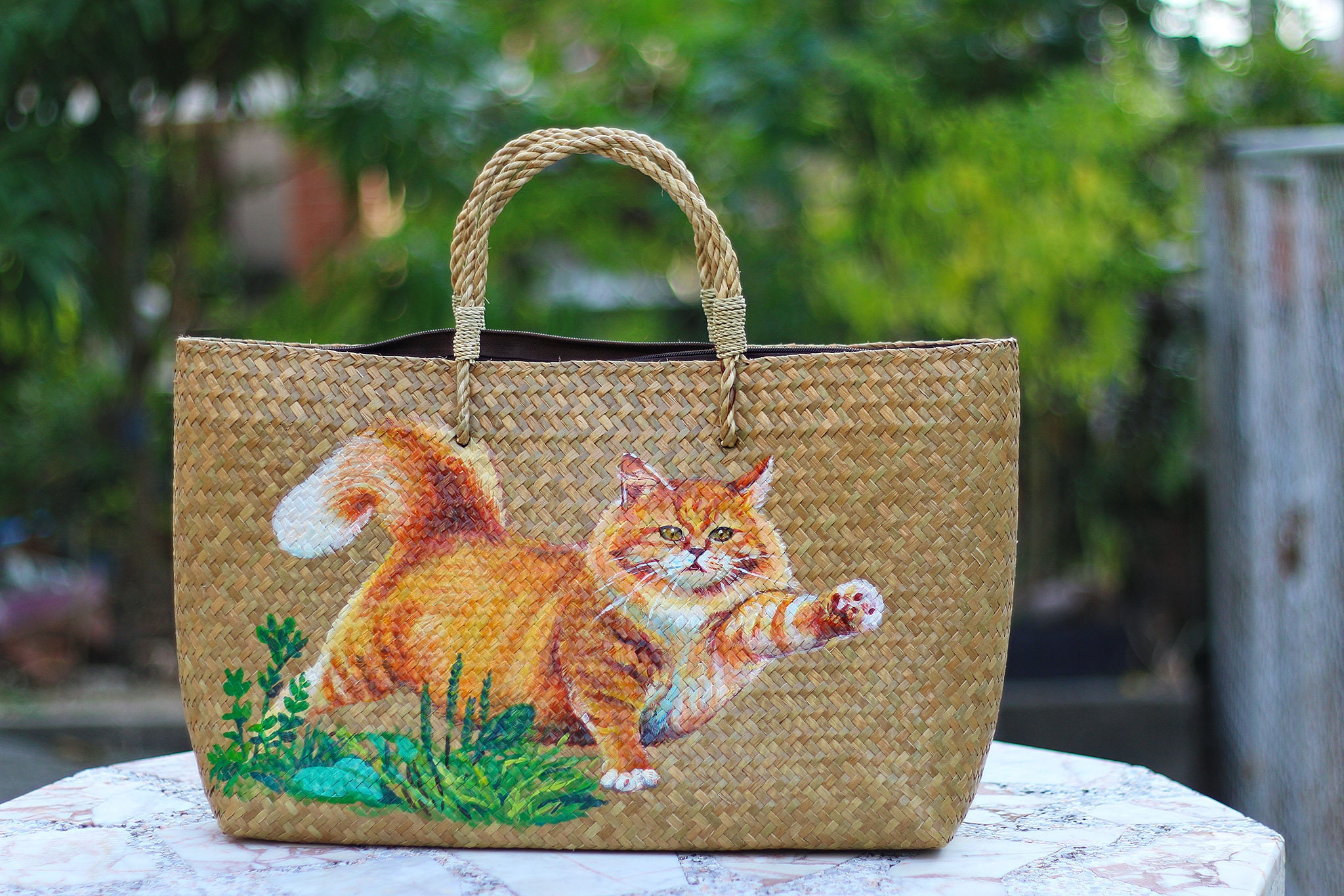 Cute hand-painted straw bags. - Picture of May Tre Decor, Ho Chi