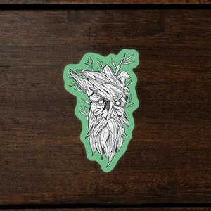 May include: A black and white line drawing of a tree spirit with a leafy beard and branches for hair. The drawing is on a green background and is a sticker.