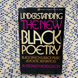 May include: A black paperback book titled "Understanding the New Black Poetry" by Stephen Henderson. The book cover features the title in large, white, bold letters with a pink "New" and a subtitle that reads "Black Speech & Black Music as Poetic References".