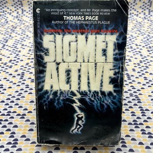 Sigmet Active - Thomas Page - Carta - Libro de bolsillo