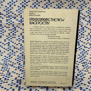 May include: A book cover with a white background and black text. The title is "Understanding the New Black Poetry". The book is part of the Morrow Paperback Editions series. The back cover features a quote from Eugenia Collier, Community College of Baltimore, and a summary of the book's contents.