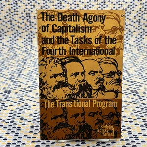 May include: A vintage book titled "The Death Agony of Capitalism and the Tasks of the Fourth International." The cover is a mix of brown and tan with portraits of historical figures. The text "The Transitional Program" is also visible.