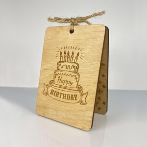Detailed vector design of a birthday cake with candles for laser engraving. High-quality laser cut card template by GoodwoodUAShop. Professional engraving layout compatible with Glowforge, xTool, and CO2 laser machines.