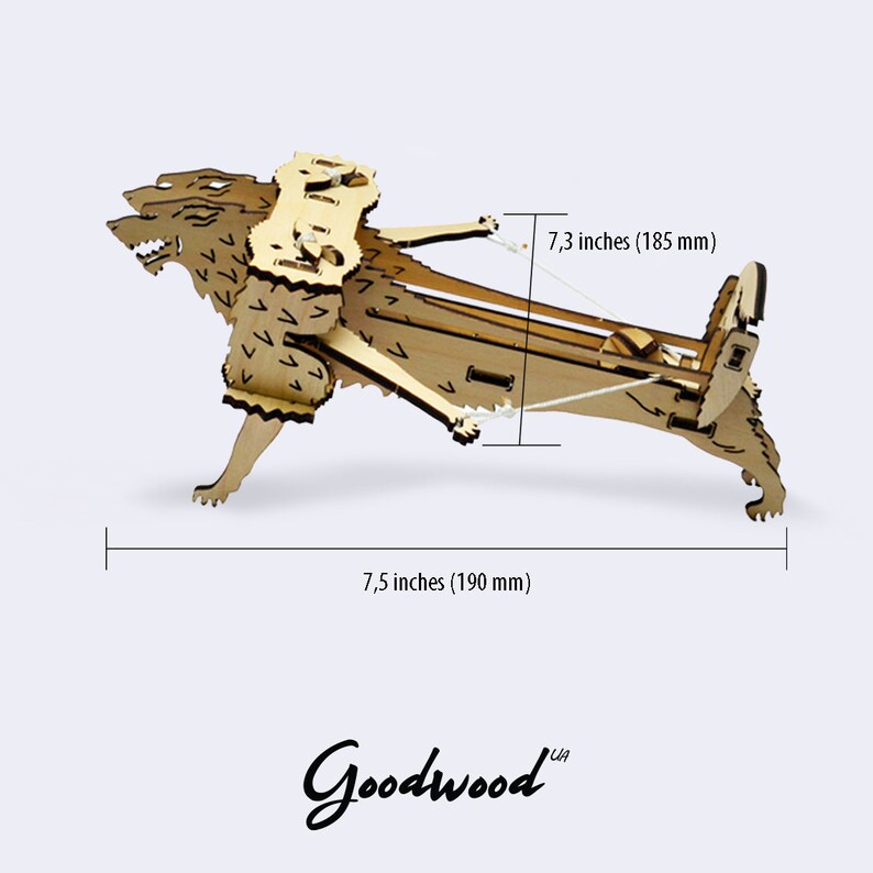 May include: Wooden model of a wolf with a crossbow attached to its back. The model is 7.5 inches long and 7.3 inches tall. The model is made by Goodwood.