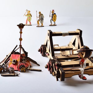 Top-down view of the assembled catapult, emphasizing the precision of the laser-cut 3mm plywood structure.