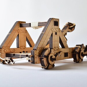 Side view of the DIY mechanical catapult model, showcasing the functional firing mechanism.