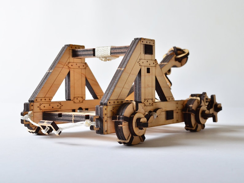Side view of the DIY mechanical catapult model, showcasing the functional firing mechanism.