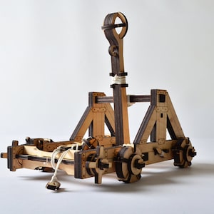 Close-up of the catapult's winch mechanism, demonstrating the mechanical functionality of the model.