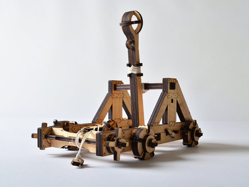 Close-up of the catapult's winch mechanism, demonstrating the mechanical functionality of the model.