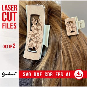 May include: Two wooden hair claw clips with floral designs. The clips are light beige with a rectangular shape and a laser-cut floral pattern. The text "LASER CUT FILES" and "SET OF 2" are visible.