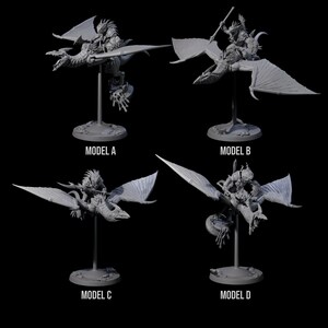 May include: Four grey miniature dragon models with riders are displayed against a black background. Each model is mounted on a stand and labelled with a letter: Model A, Model B, Model C, and Model D. The dragons have detailed wings and open mouths.