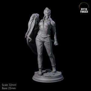 May include: A gray, detailed miniature figurine of a woman wearing a corset, pants, and a cloak. She is holding a dagger in her right hand. The figurine is standing on a round base. The text "MYTH FORGED" is visible in the upper right corner of the image.  Scale: 32mm, Base: 25mm.