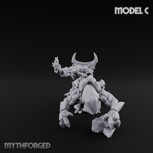 May include: A gray, 3D-printed fantasy miniature of a creature with a horned head, a large weapon, and a rocky, armored body. The text "MODEL C" is in the upper right corner, and "MYTHFORGED" is at the bottom.