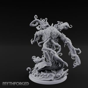 May include: A grey resin miniature figure of a multi-tentacled creature with a central eye and a jagged maw, standing on a circular base scattered with small skulls and debris. The text MYTHFORGED is printed in the bottom left corner of the image.