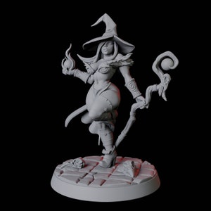 May include: A gray 3D printed miniature of a female witch wearing a pointed hat and holding a staff with a sphere on top. She is standing on a circular base with a textured surface.