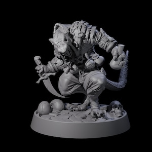 May include: A grey figurine of a humanoid rat-like creature in a crouching pose, holding a curved blade. The figure is detailed with armour, pouches, and a tail. Skulls and eggs are at the base.
