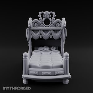 May include: A gray miniature bed featuring a tufted mattress, three round pillows, and a canopy frame with draped fabric details. The headboard displays an ornate circular crest with shell-like accents. The text MYTHFORGED appears at the bottom.