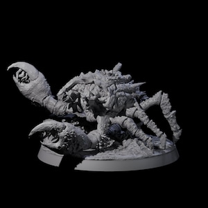 May include: A detailed, gray crab figurine with large claws and a textured exoskeleton. The crab is posed on a circular base, with intricate detailing on its body and legs, set against a black background.
