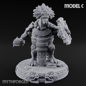 May include: A gray, detailed figurine of a warrior with a feathered headdress, holding a shield and a weapon. The figurine is on a decorative base with the text "MYTHFORGED" and "MODEL C". The warrior is adorned with intricate armor and jewelry.