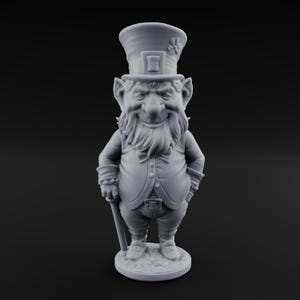 May include: A gray figurine of a leprechaun, wearing a top hat with a shamrock, a waistcoat, and holding a cane. The leprechaun has a long beard and is smiling. The figurine is standing on a round base.