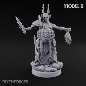 May include: A gray resin miniature figure of a warrior wearing a horned helmet and armor, holding a serrated dagger in one hand and a severed head in the other. The figure stands on a rocky base with the text MODEL B and MYTHFORGED visible.