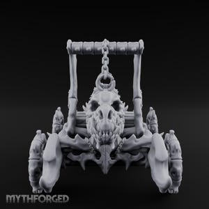 May include: A light gray miniature model of a skeletal chariot featuring a central skull with sharp teeth, connected by a chain to a top bar. The structure is supported by four wheels with bone-like spokes and includes the text MYTHFORGED at the base.