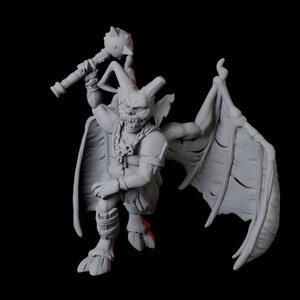 May include: A grey, detailed miniature figurine of a winged demon with a club. The demon has a fierce expression and is wearing a chain necklace.