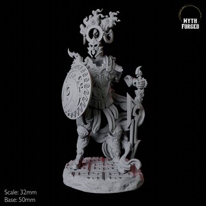 May include: A detailed, gray 3D-printed figurine of a warrior, holding a shield and a stylized sword. The warrior is wearing ornate armor and a helmet with a halo-like design. The base is 50mm, and the figure is 32mm tall. The text "Myth Forged" is in the upper right corner.